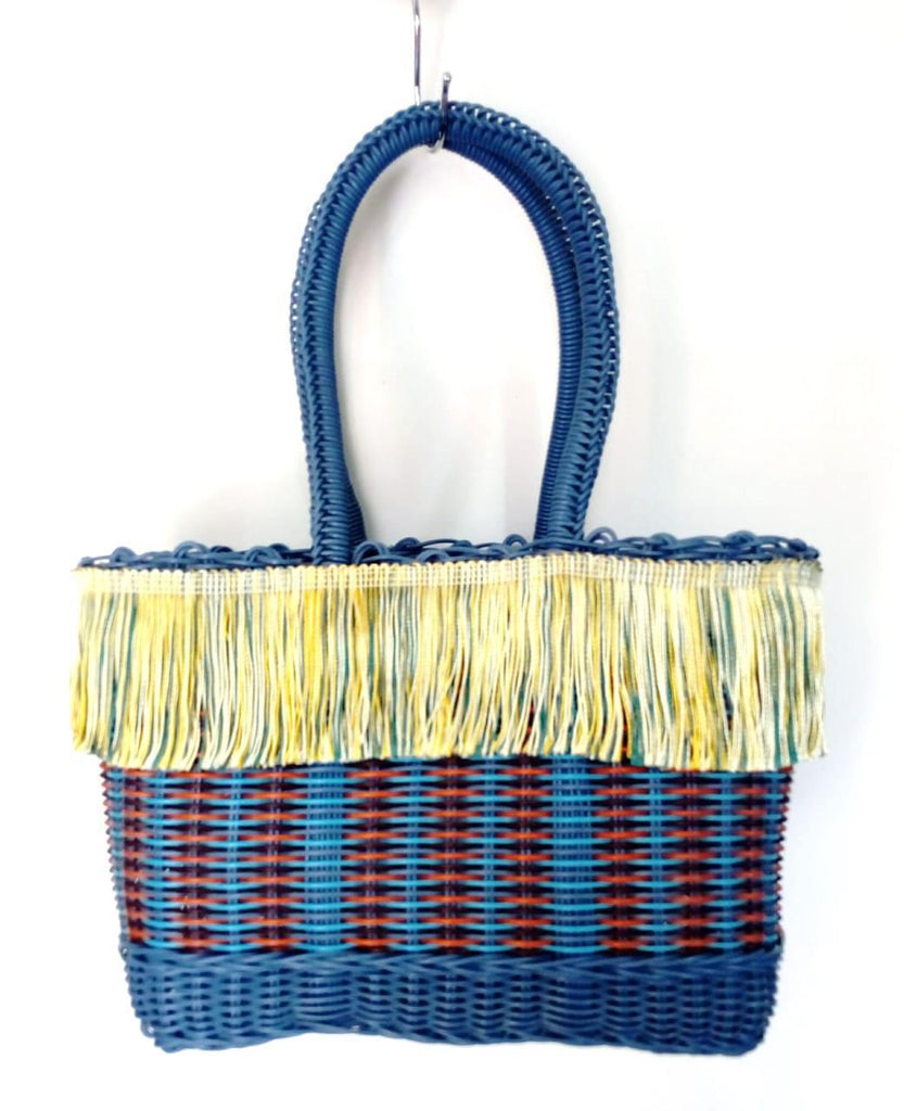 Bolsa para mujer azul y amarillo tejida con flecos amarillos 
