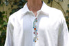 Camisa para hombre blanca con tira bordada al centro en flores de colores